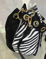 BOLSO PIEL CEBRA REDONDO